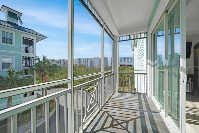 unfurnished sunroom with a healthy amount of sunlight