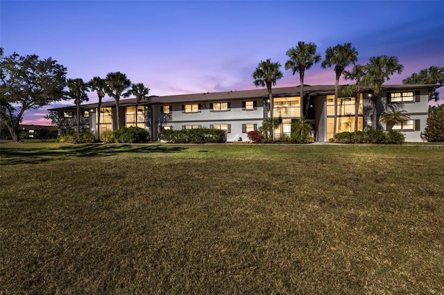 view of front of home with a lawn