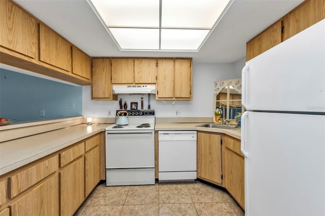 kitchen with sink, light tile patterned flooring, and white appliances