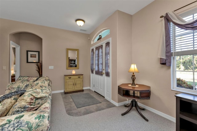 entryway featuring carpet flooring