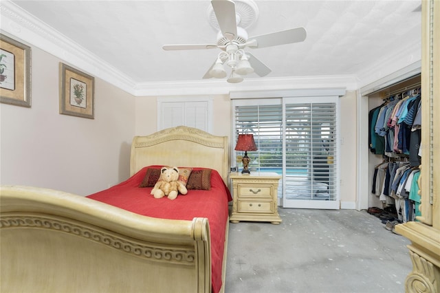 bedroom featuring ceiling fan, crown molding, and a closet