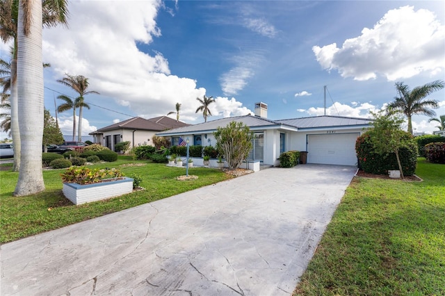 ranch-style house featuring a garage and a front lawn