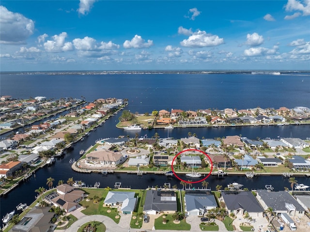 drone / aerial view with a water view