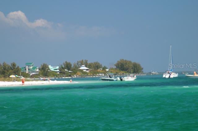 view of water feature with a beach view