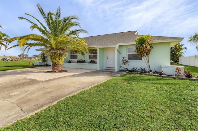 view of front facade featuring a front yard