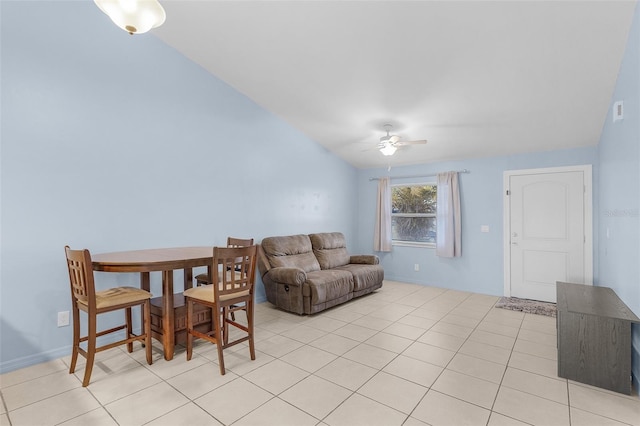 living room with vaulted ceiling, light tile patterned floors, and ceiling fan