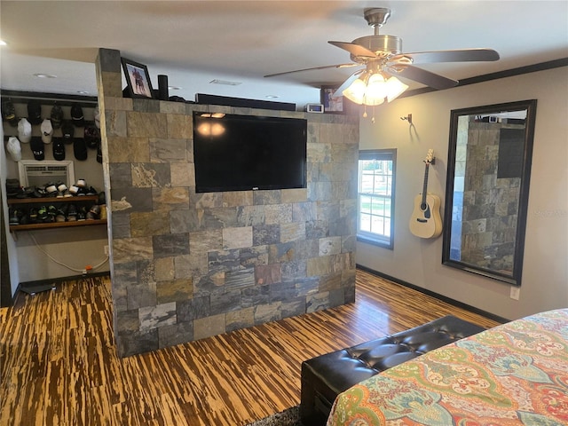 bedroom featuring hardwood / wood-style flooring, a closet, and ceiling fan