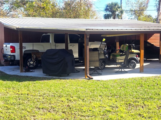 view of parking / parking lot featuring a yard