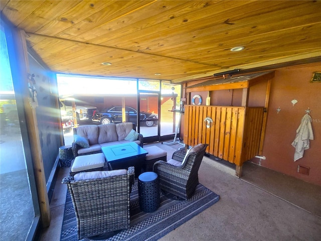 sunroom / solarium featuring wooden ceiling