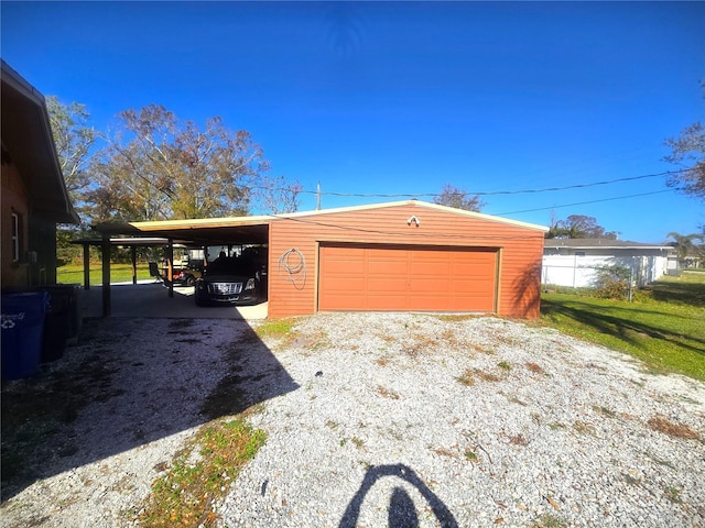 garage with a yard