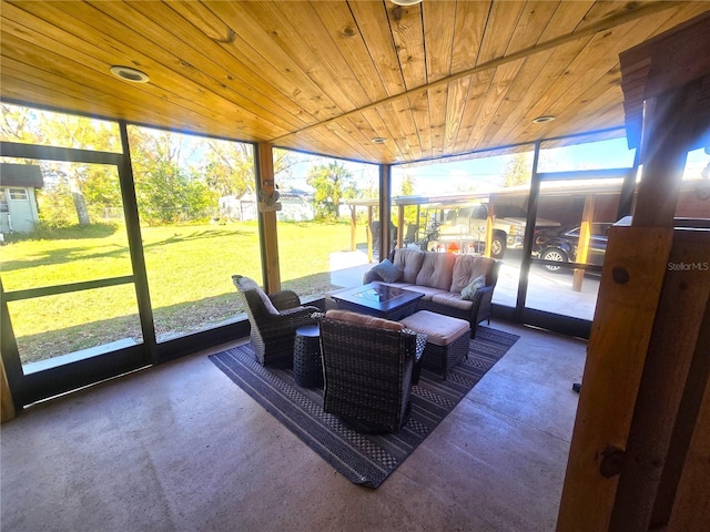 sunroom featuring wood ceiling