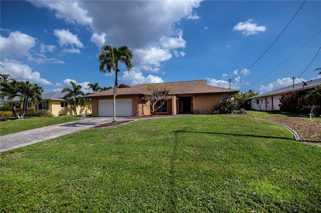 ranch-style house with a front yard and a garage