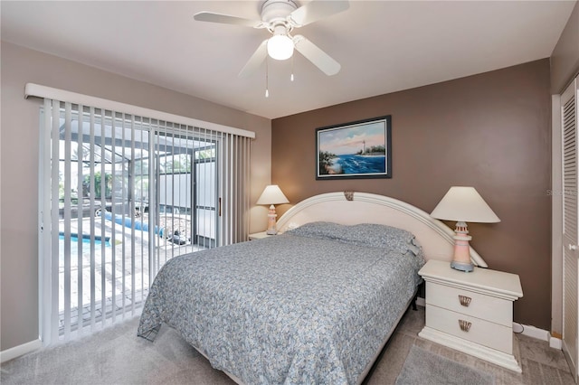 carpeted bedroom featuring access to exterior, a closet, and ceiling fan