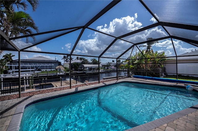 view of pool with a lanai