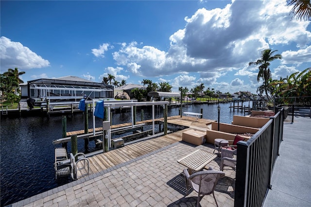 dock area featuring a water view