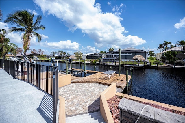 dock area featuring a water view and a lanai