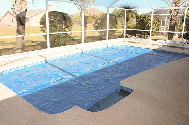 view of pool with a mountain view and a lanai