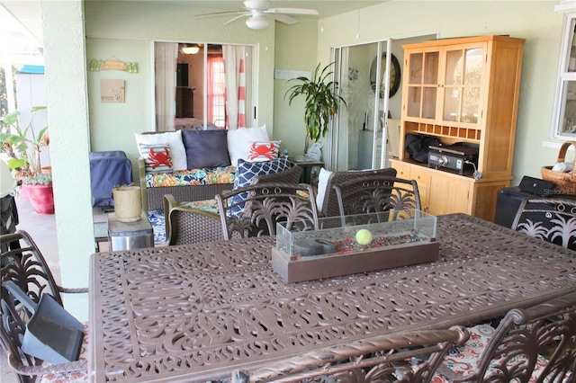 dining room featuring ceiling fan