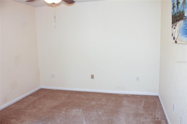 empty room with ceiling fan and light colored carpet