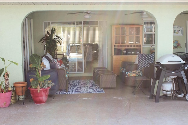 view of patio / terrace featuring ceiling fan