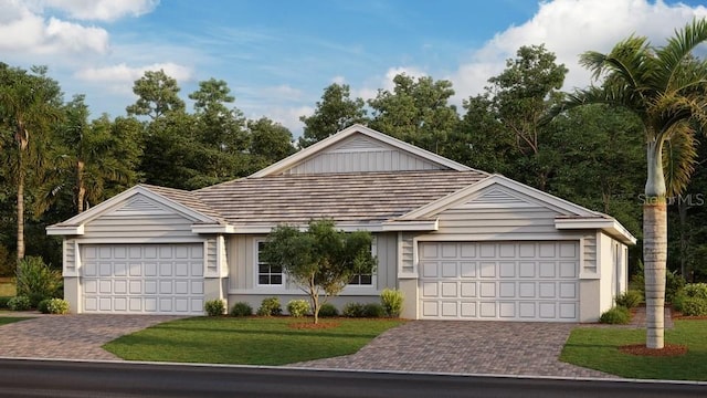 single story home featuring a garage and decorative driveway