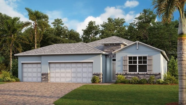 ranch-style house featuring a garage and a front lawn