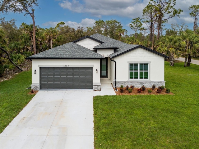 view of front of property with a shingled roof, concrete driveway, an attached garage, a front lawn, and stucco siding