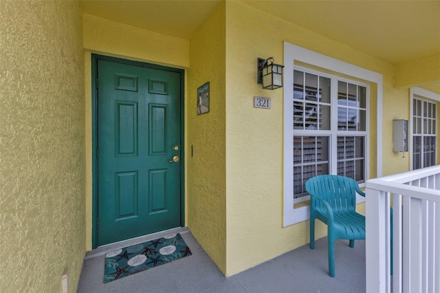 property entrance with a porch