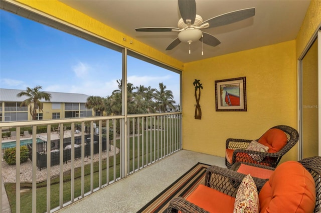 balcony featuring ceiling fan