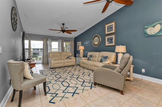 2000 Bal Harbor Blvd Unit 321, Punta Gorda, FL 33950 - living room with light tile patterned floors, ceiling fan, baseboards, and lofted ceiling