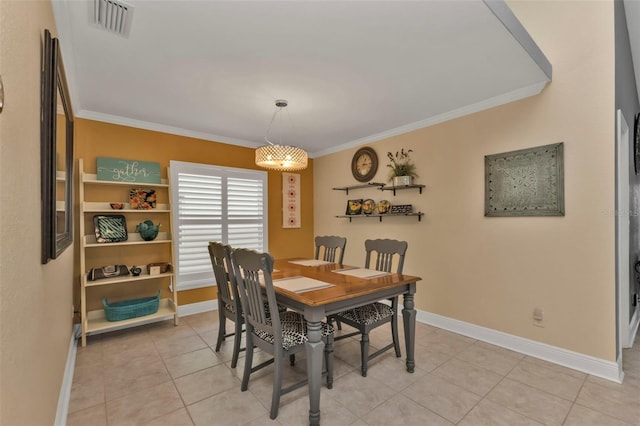 2000 Bal Harbor Blvd Unit 321, Punta Gorda, FL 33950 - dining area featuring crown molding, baseboards, and visible vents