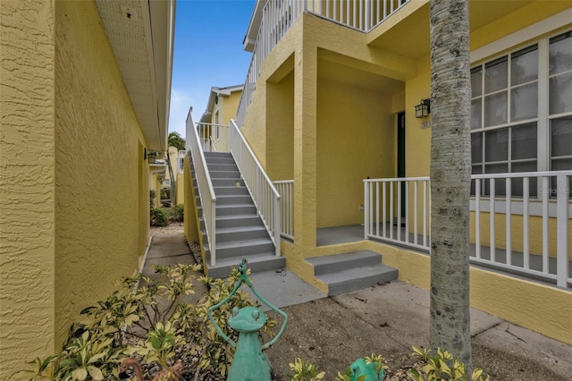 2000 Bal Harbor Blvd Unit 321, Punta Gorda, FL 33950 - exterior space featuring stairs and stucco siding
