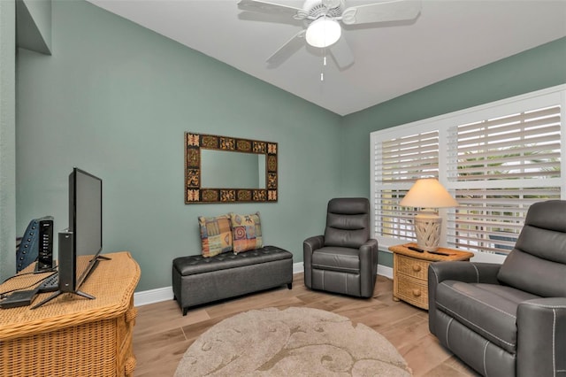2000 Bal Harbor Blvd Unit 321, Punta Gorda, FL 33950 - sitting room with ceiling fan, baseboards, vaulted ceiling, and light wood-style flooring