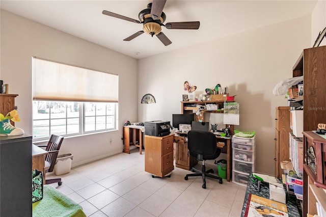 office with ceiling fan and light tile patterned floors