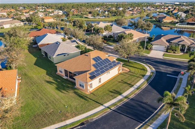 drone / aerial view with a water view