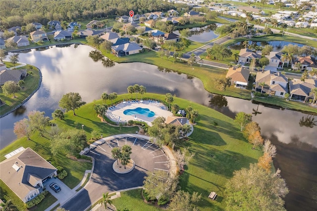 drone / aerial view with a water view