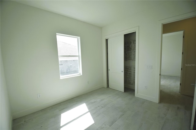 unfurnished bedroom with light hardwood / wood-style floors