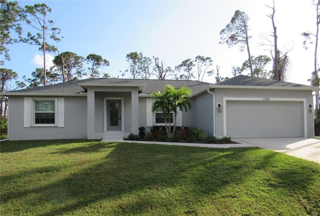 single story home featuring a garage and a front yard