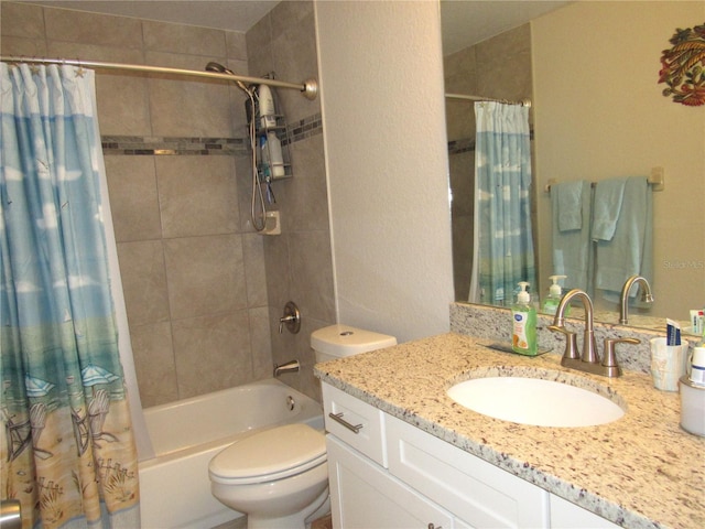 full bathroom with shower / bath combo with shower curtain, vanity, and toilet