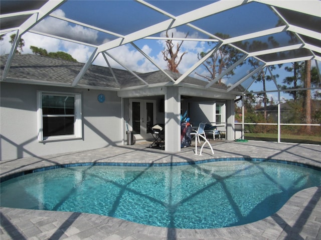 view of pool featuring a lanai and a patio