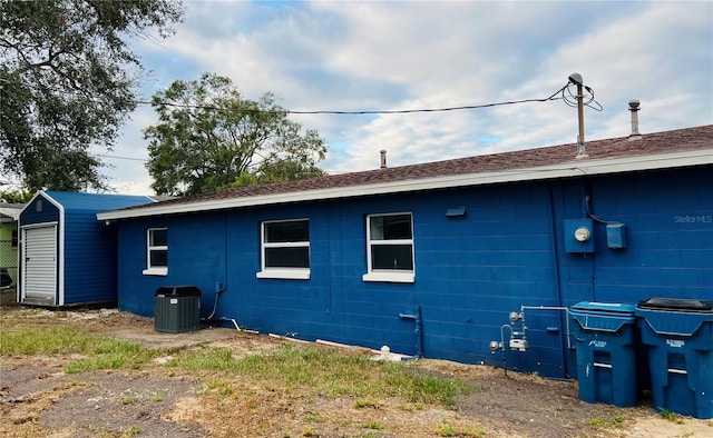 view of side of home with cooling unit