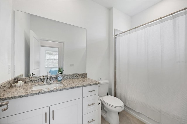 full bathroom with vanity, toilet, and shower / bath combination with curtain