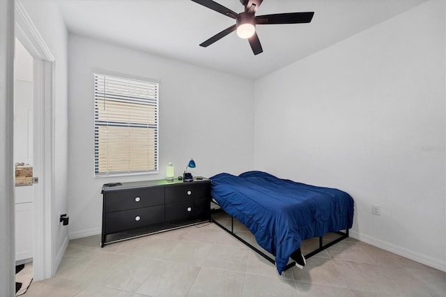 bedroom with light tile patterned flooring and ceiling fan