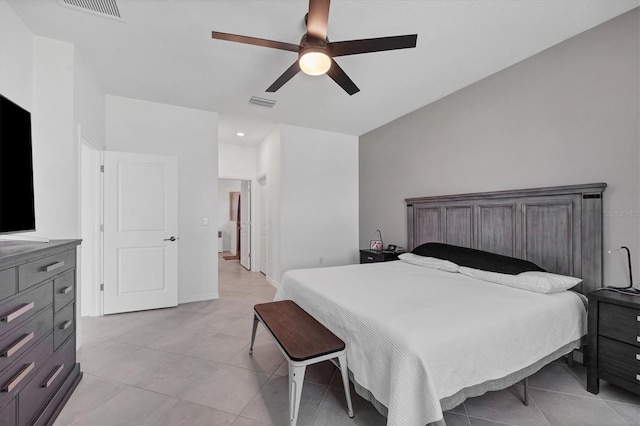 tiled bedroom with ceiling fan