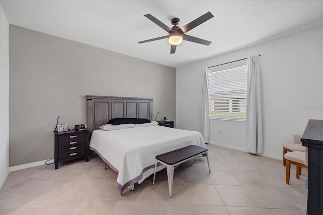 tiled bedroom with ceiling fan