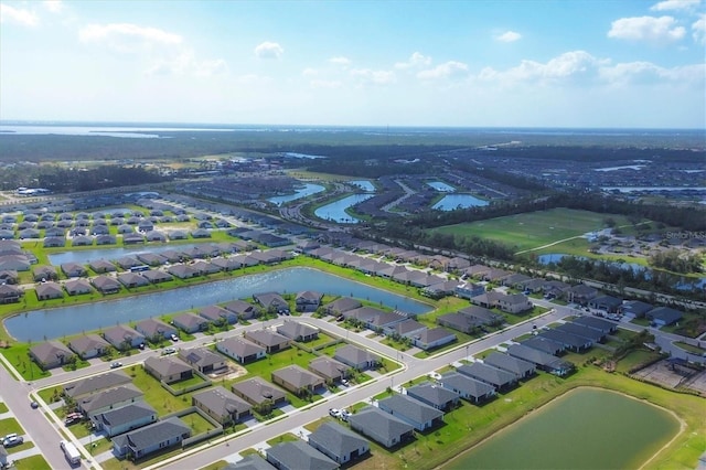 drone / aerial view with a water view