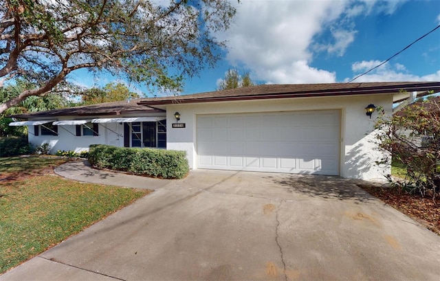 single story home featuring a garage