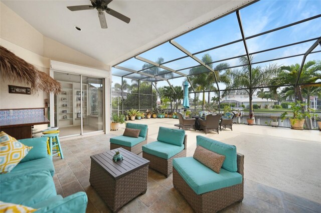 view of patio / terrace with glass enclosure and ceiling fan