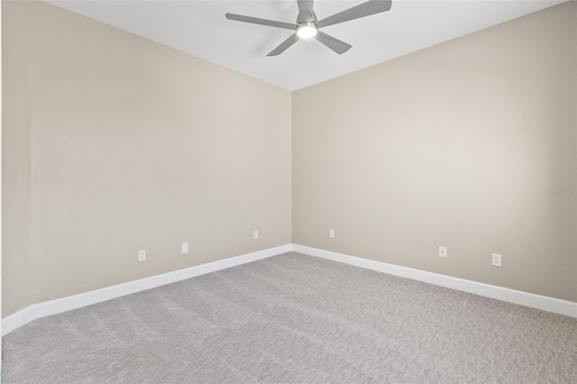 unfurnished room with carpet and ceiling fan