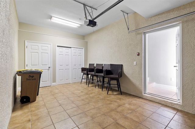 interior space featuring light tile patterned floors